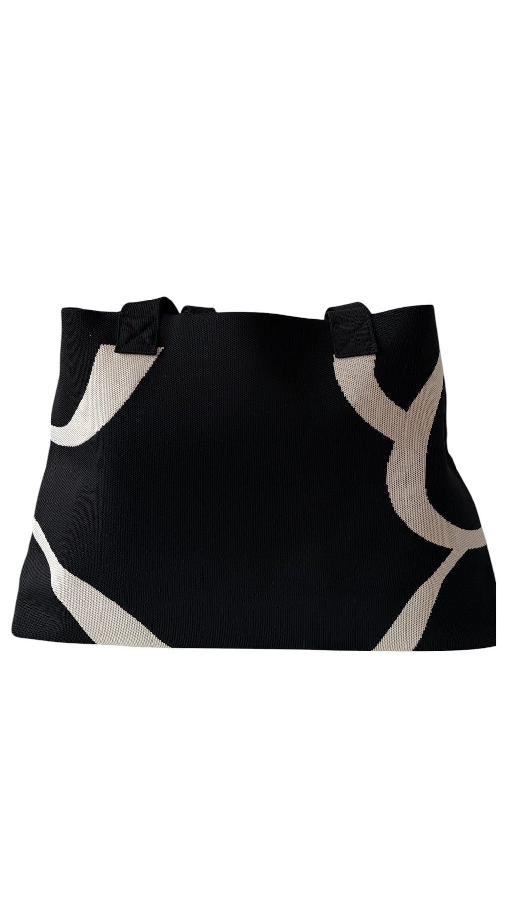 Back view of black UTTAL jacquard knit tote bag featuring premium woven fabric and sturdy shoulder straps