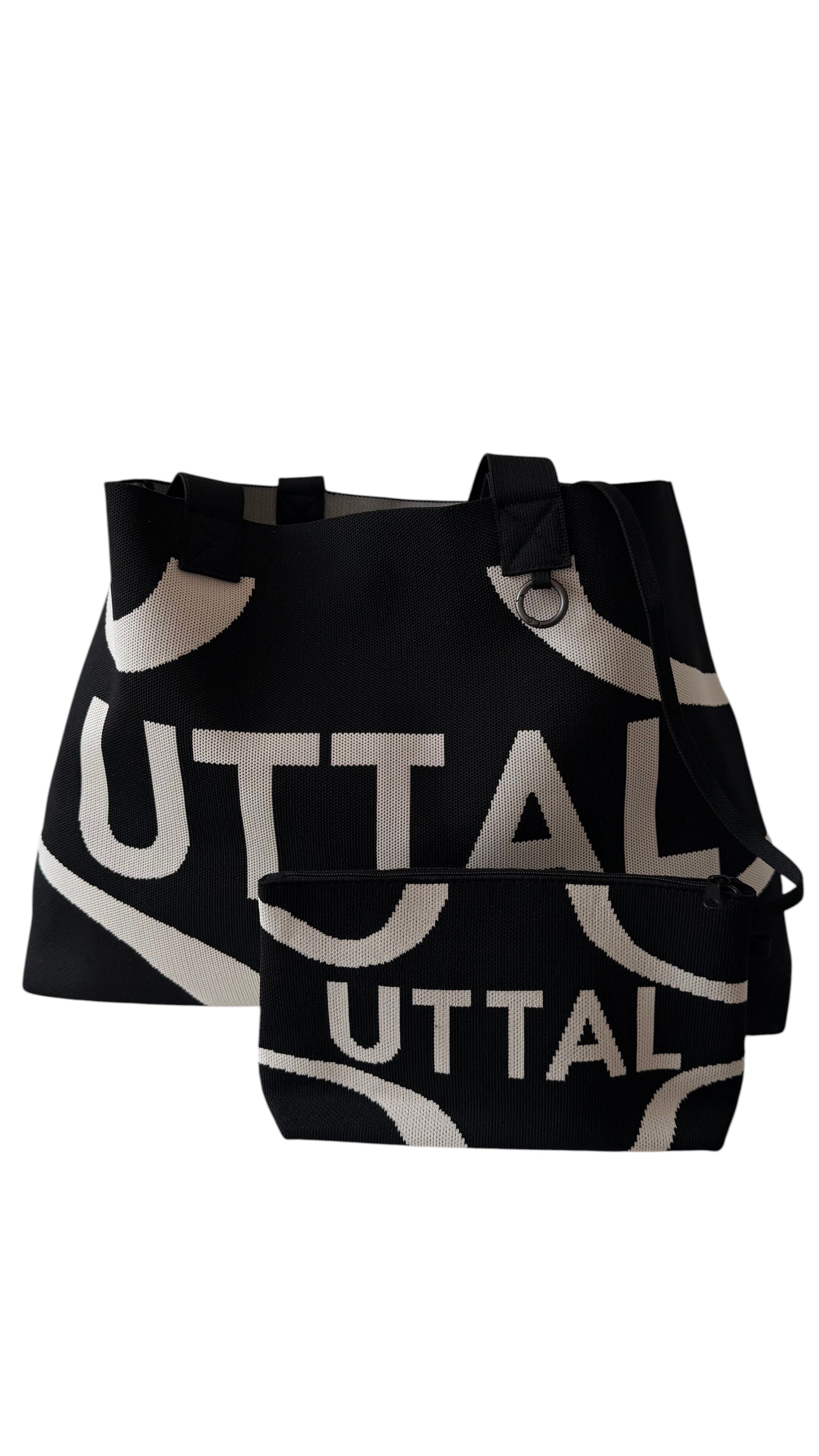 Black UTTAL jacquard knit tote bag with matching pouch, structured silhouette and premium woven fabric