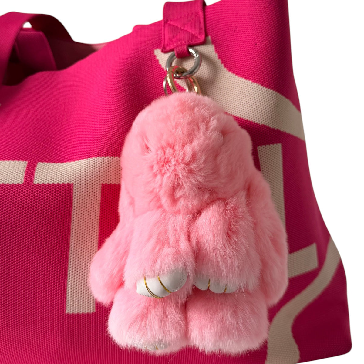 UTTAL Blush Pink Plushy Bunny Bag Charm in soft pink with gold-tone ring