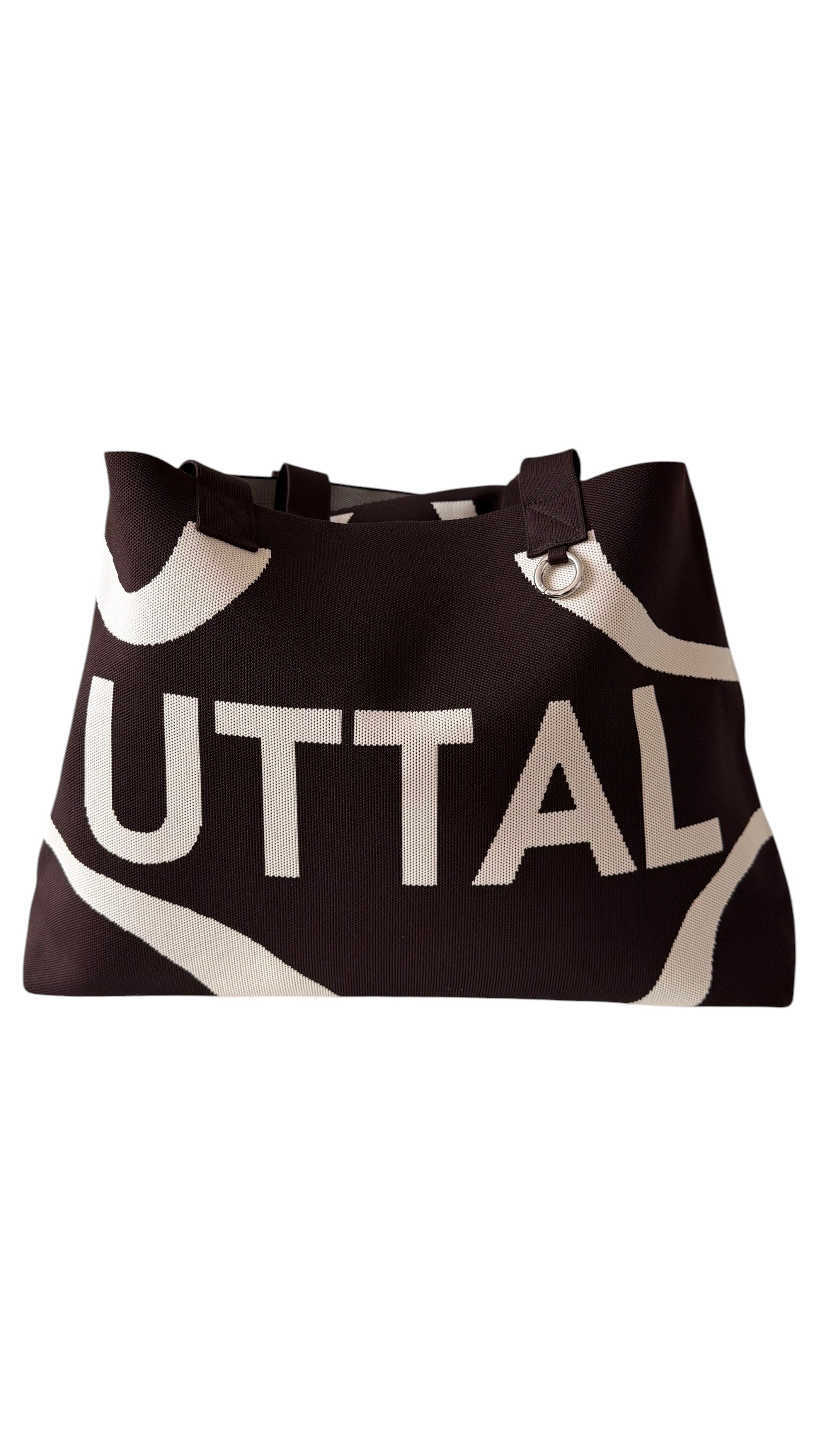 Chocolate Brown UTTAL jacquard knit tote bag with structured silhouette, premium woven fabric and spacious interior on a white background