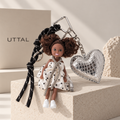 UTTAL Dolly Bag Charm with brunette doll, silver heart charm and black rope strap
