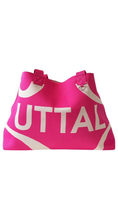 Close-up of pink UTTAL tote bag showing premium jacquard knit fabric, durable stitching and woven texture